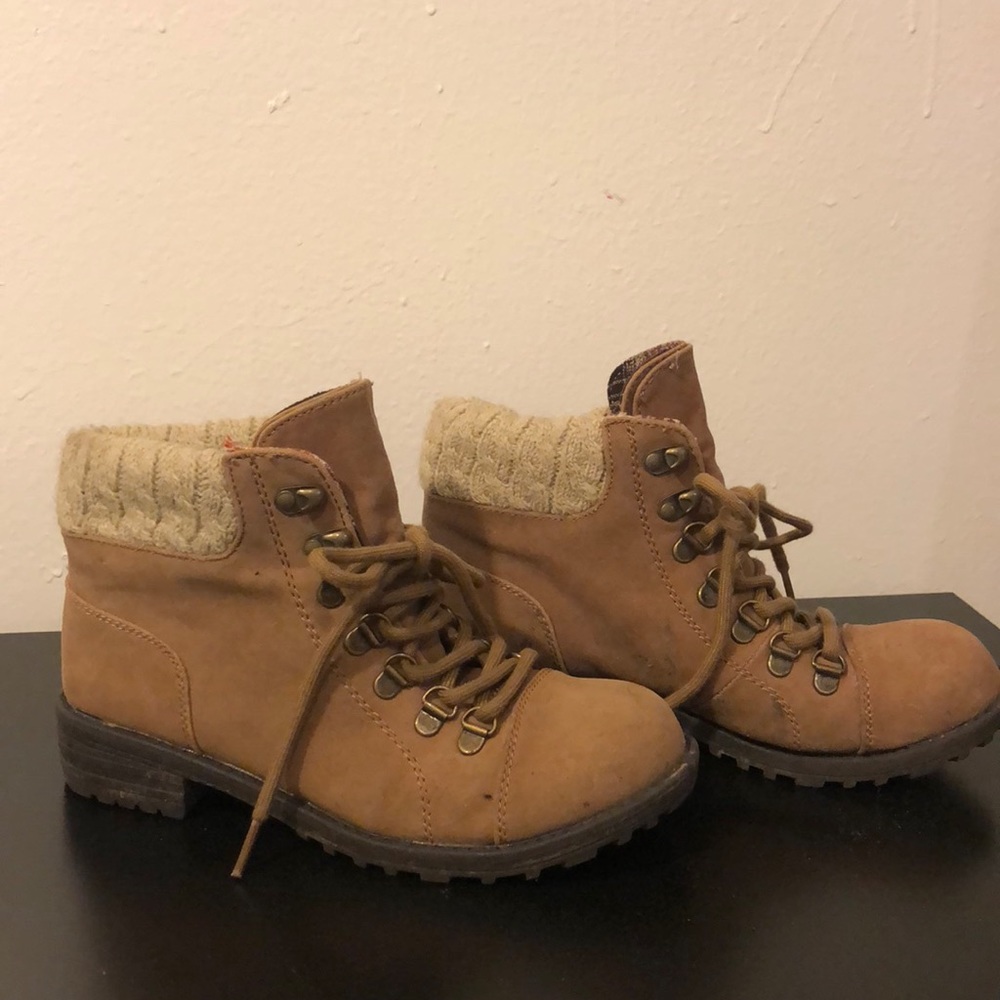 brown boots with sweater material accents